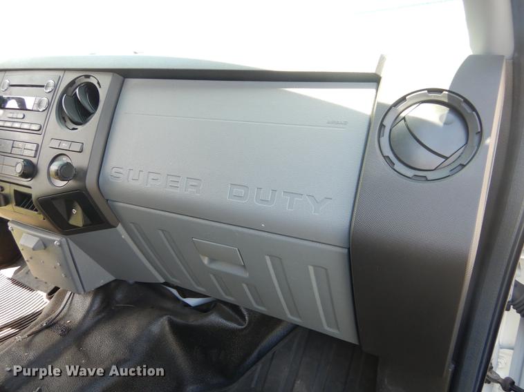 image for item DC0466 2012 Ford F250 Super Duty Crew Cab utility bed pickup truck