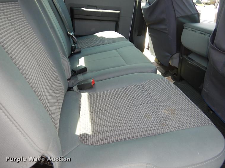 image for item DC0466 2012 Ford F250 Super Duty Crew Cab utility bed pickup truck