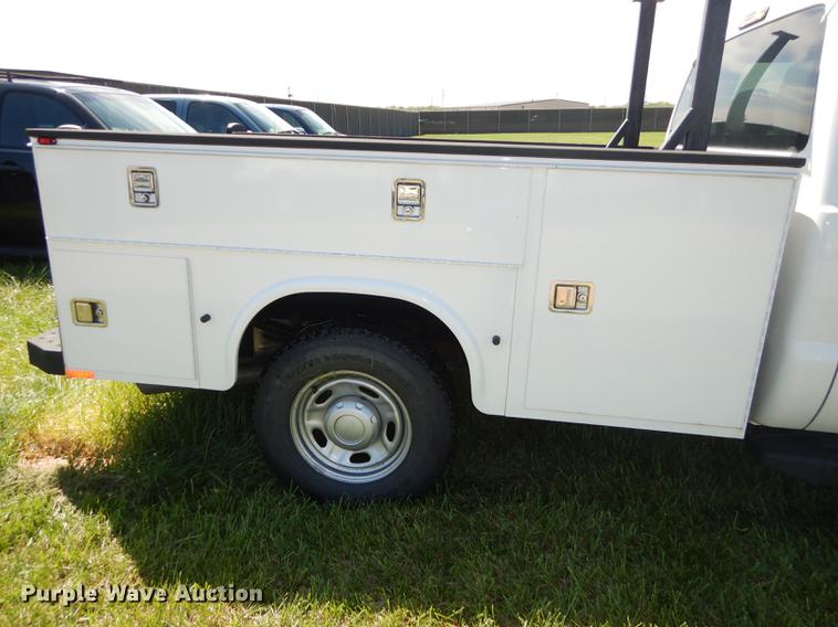 image for item DC0466 2012 Ford F250 Super Duty Crew Cab utility bed pickup truck