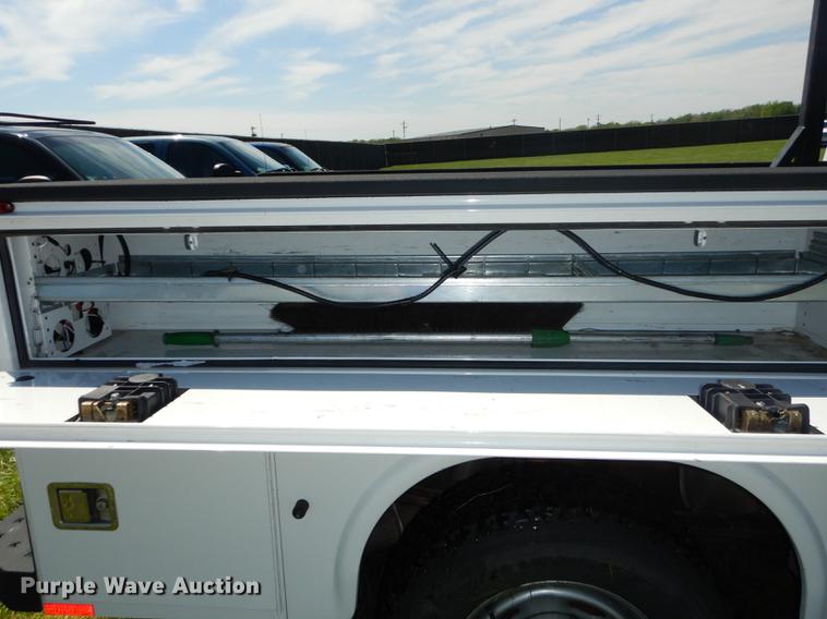 image for item DC0466 2012 Ford F250 Super Duty Crew Cab utility bed pickup truck