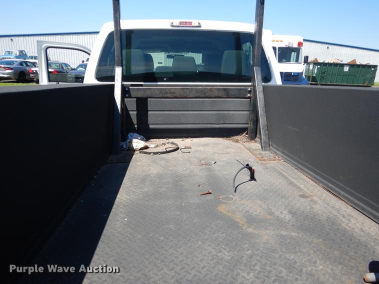 image for item DC0466 2012 Ford F250 Super Duty Crew Cab utility bed pickup truck