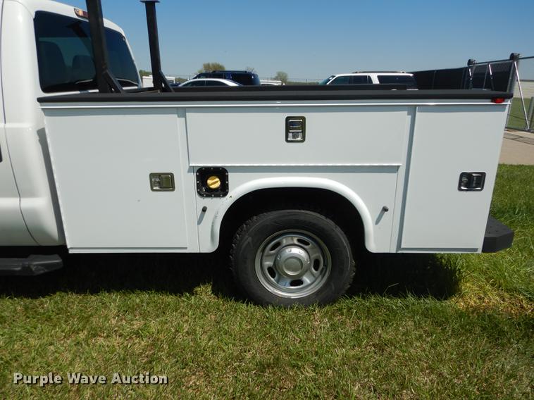 image for item DC0466 2012 Ford F250 Super Duty Crew Cab utility bed pickup truck