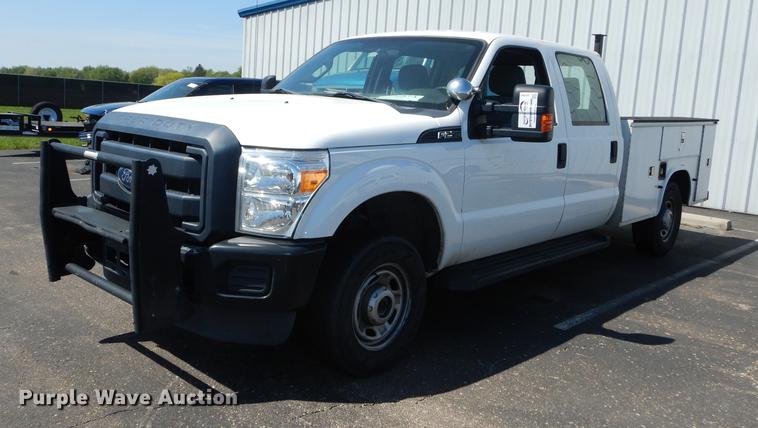 image for item DE1641 2014 Ford F250 Super Duty Crew Cab utility bed pickup truck