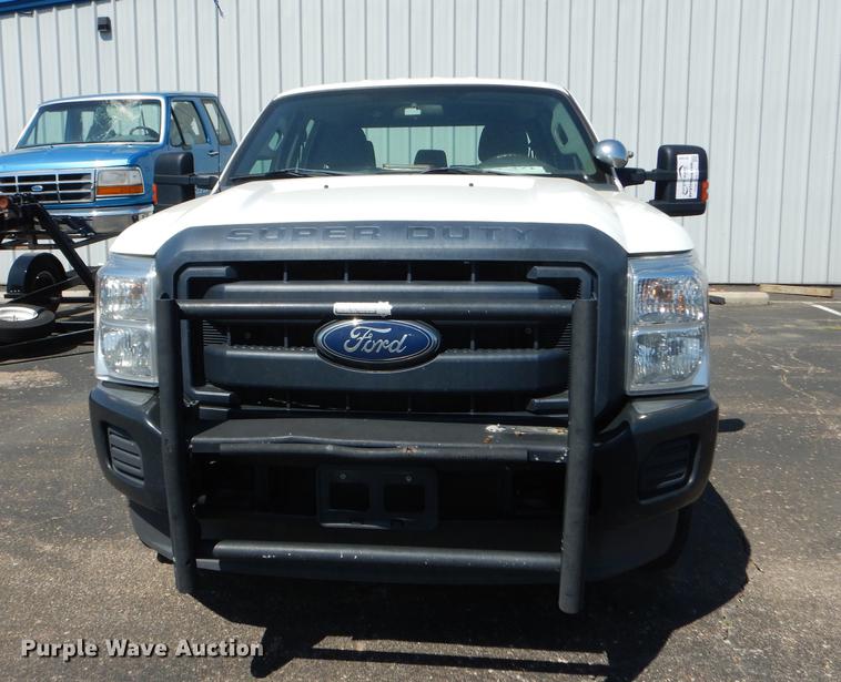 image for item DE1641 2014 Ford F250 Super Duty Crew Cab utility bed pickup truck