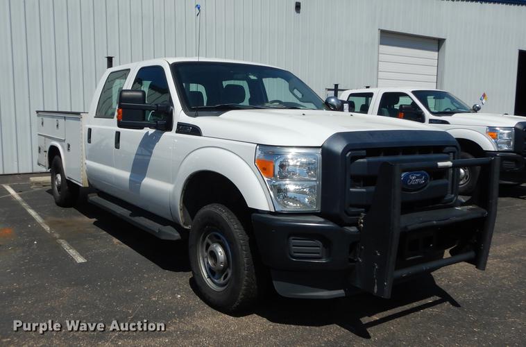 image for item DE1641 2014 Ford F250 Super Duty Crew Cab utility bed pickup truck