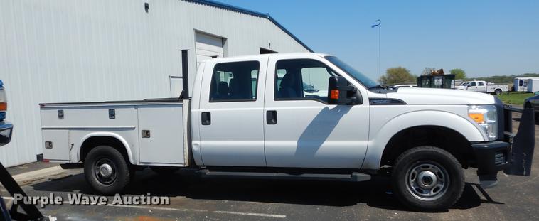 image for item DE1641 2014 Ford F250 Super Duty Crew Cab utility bed pickup truck