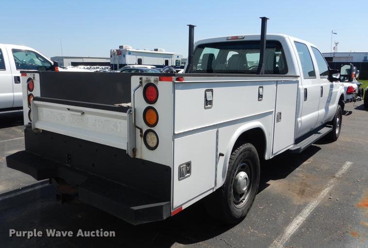 image for item DE1641 2014 Ford F250 Super Duty Crew Cab utility bed pickup truck