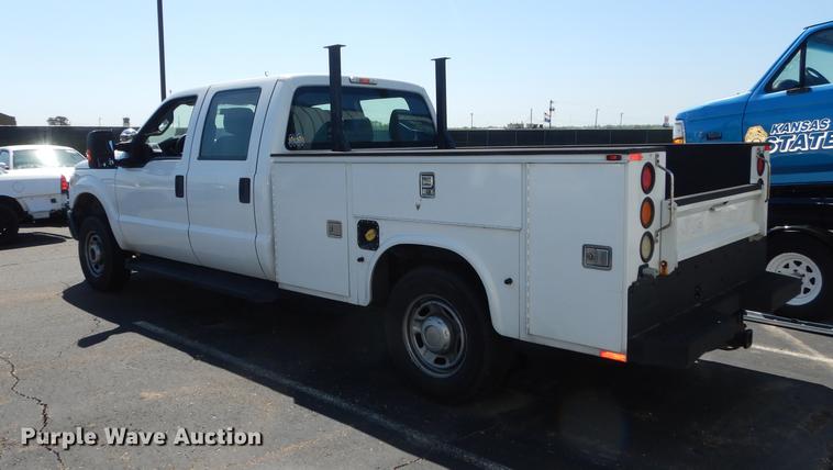 image for item DE1641 2014 Ford F250 Super Duty Crew Cab utility bed pickup truck