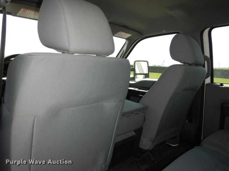 image for item DE1641 2014 Ford F250 Super Duty Crew Cab utility bed pickup truck