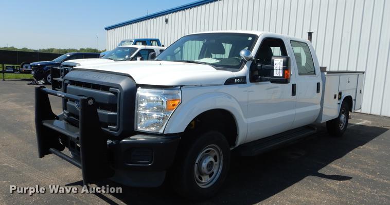 image for item DE1642 2014 Ford F250 Super Duty Crew Cab utility bed pickup truck