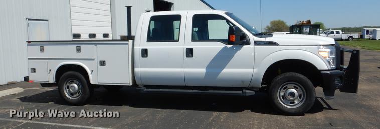 image for item DE1642 2014 Ford F250 Super Duty Crew Cab utility bed pickup truck