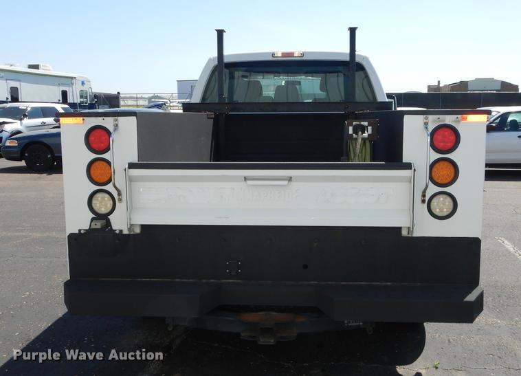 image for item DE1642 2014 Ford F250 Super Duty Crew Cab utility bed pickup truck