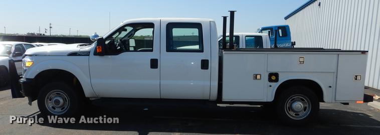 image for item DE1642 2014 Ford F250 Super Duty Crew Cab utility bed pickup truck