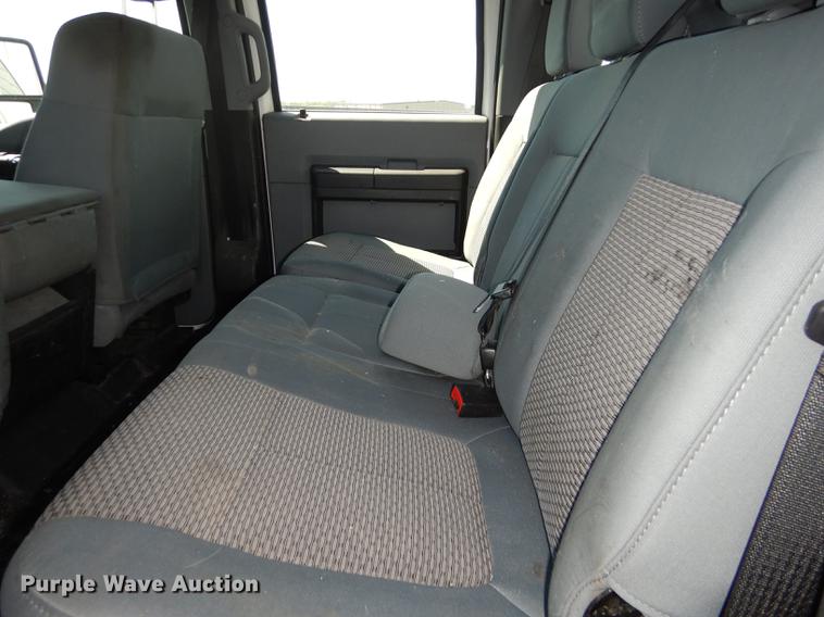 image for item DE1642 2014 Ford F250 Super Duty Crew Cab utility bed pickup truck