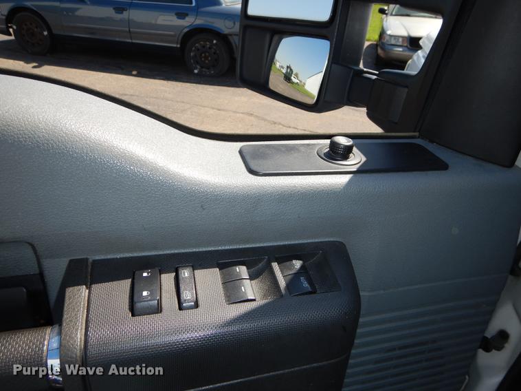 image for item DE1642 2014 Ford F250 Super Duty Crew Cab utility bed pickup truck