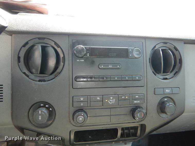 image for item DE1642 2014 Ford F250 Super Duty Crew Cab utility bed pickup truck