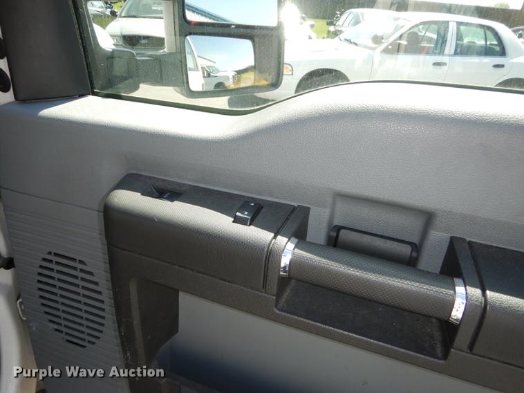 image for item DE1642 2014 Ford F250 Super Duty Crew Cab utility bed pickup truck