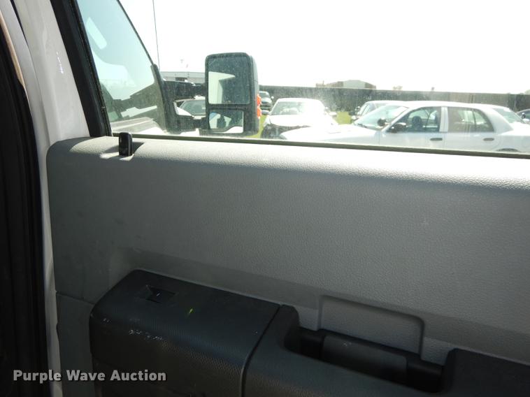 image for item DE1642 2014 Ford F250 Super Duty Crew Cab utility bed pickup truck