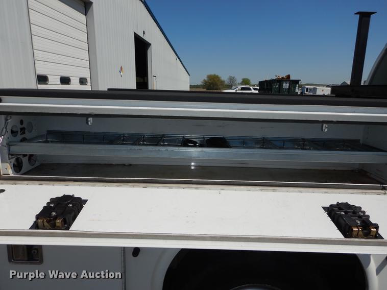 image for item DE1642 2014 Ford F250 Super Duty Crew Cab utility bed pickup truck