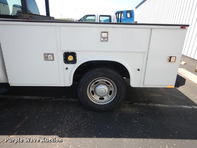 image for item DE1642 2014 Ford F250 Super Duty Crew Cab utility bed pickup truck