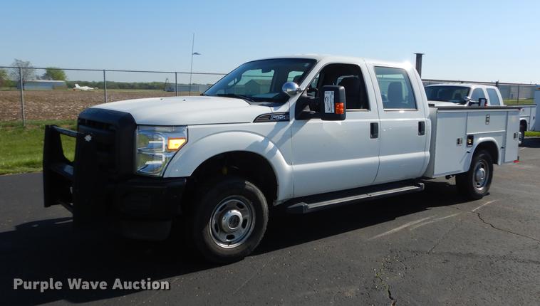 image for item DE1645 2012 Ford F250 Super Duty Crew Cab utility bed pickup truck