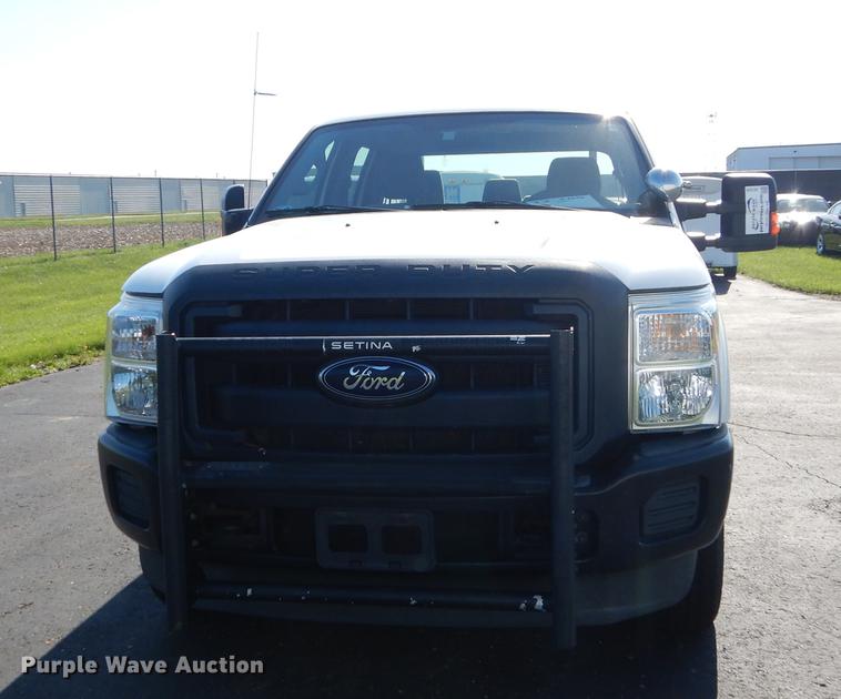 image for item DE1645 2012 Ford F250 Super Duty Crew Cab utility bed pickup truck