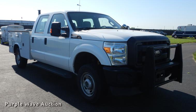 image for item DE1645 2012 Ford F250 Super Duty Crew Cab utility bed pickup truck