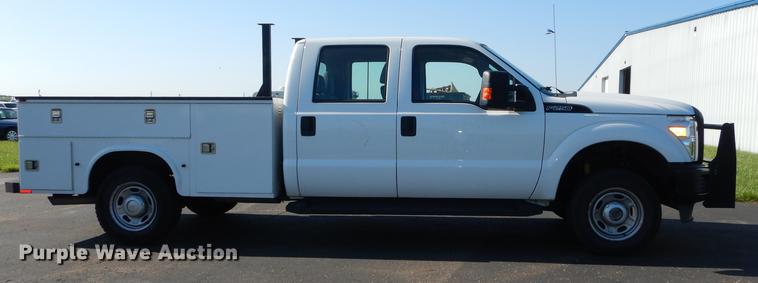 image for item DE1645 2012 Ford F250 Super Duty Crew Cab utility bed pickup truck