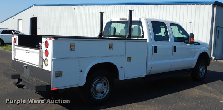 image for item DE1645 2012 Ford F250 Super Duty Crew Cab utility bed pickup truck