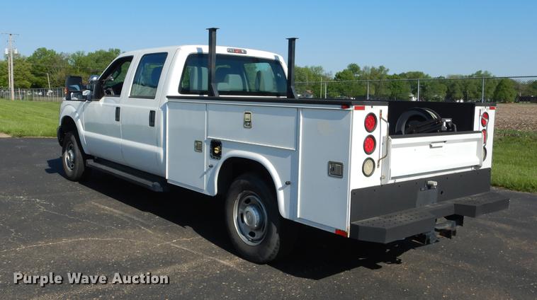 image for item DE1645 2012 Ford F250 Super Duty Crew Cab utility bed pickup truck