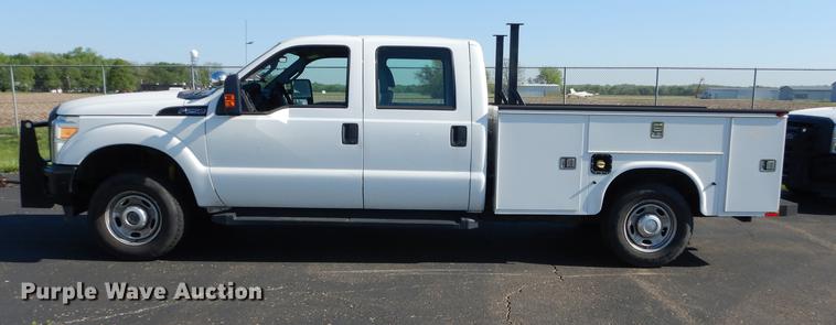 image for item DE1645 2012 Ford F250 Super Duty Crew Cab utility bed pickup truck