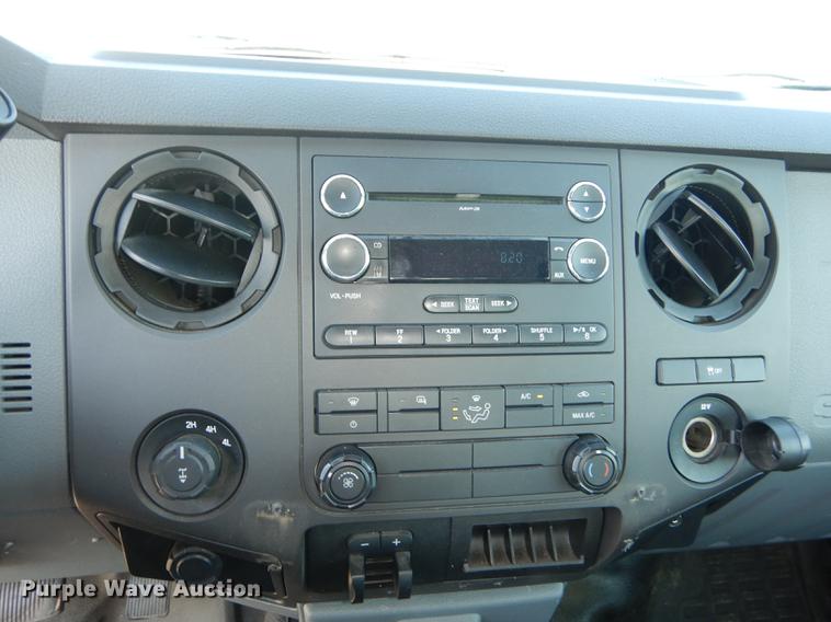 image for item DE1645 2012 Ford F250 Super Duty Crew Cab utility bed pickup truck