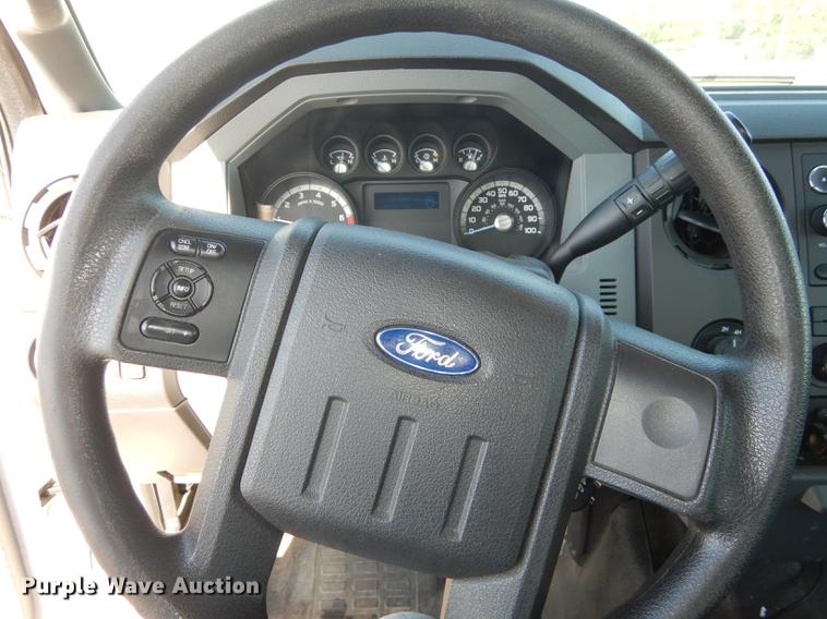 image for item DE1645 2012 Ford F250 Super Duty Crew Cab utility bed pickup truck