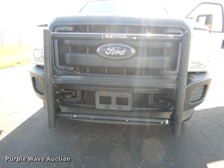 image for item DE1645 2012 Ford F250 Super Duty Crew Cab utility bed pickup truck