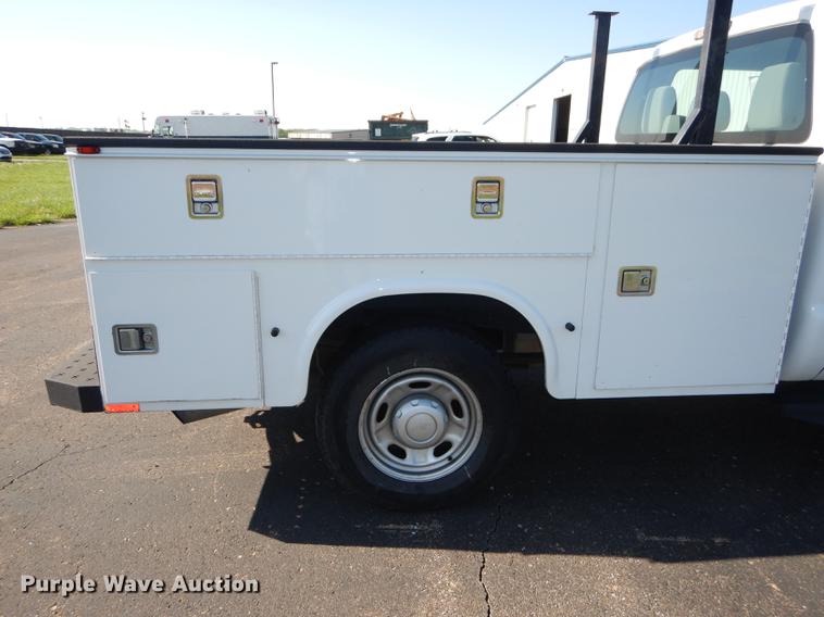 image for item DE1645 2012 Ford F250 Super Duty Crew Cab utility bed pickup truck