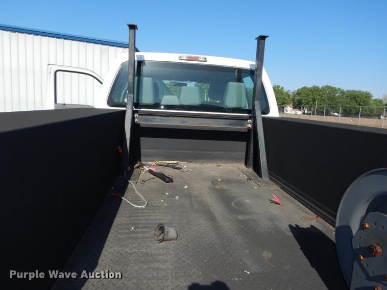 image for item DE1645 2012 Ford F250 Super Duty Crew Cab utility bed pickup truck