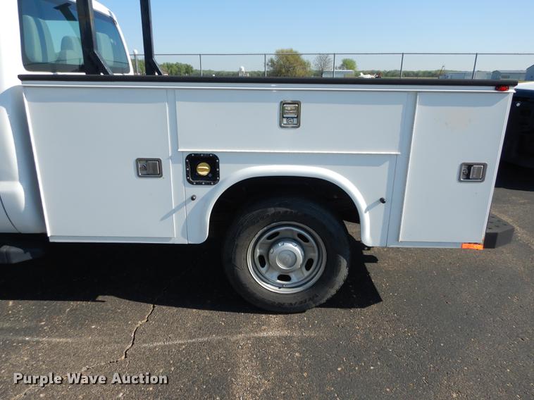 image for item DE1645 2012 Ford F250 Super Duty Crew Cab utility bed pickup truck