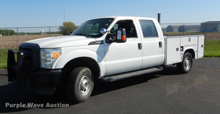 image for item DE1646 2012 Ford F250 Super Duty Crew Cab utility bed pickup truck