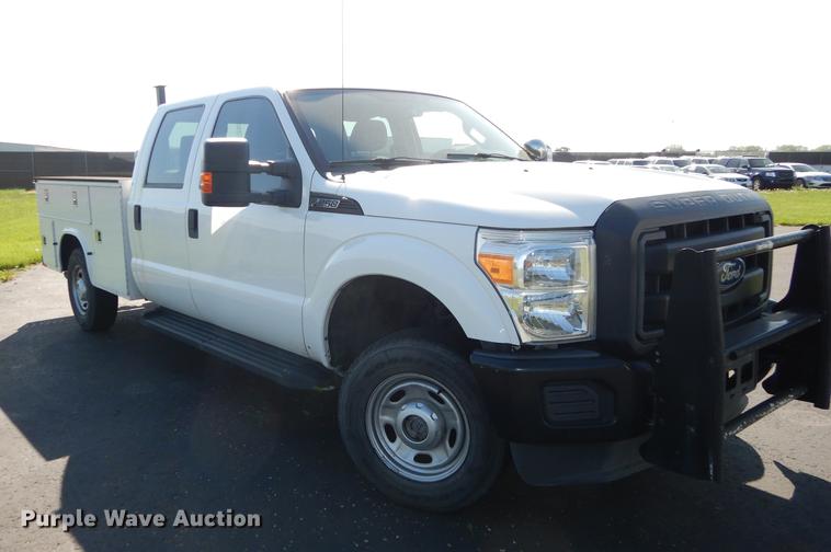 image for item DE1646 2012 Ford F250 Super Duty Crew Cab utility bed pickup truck