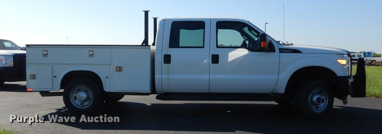 image for item DE1646 2012 Ford F250 Super Duty Crew Cab utility bed pickup truck