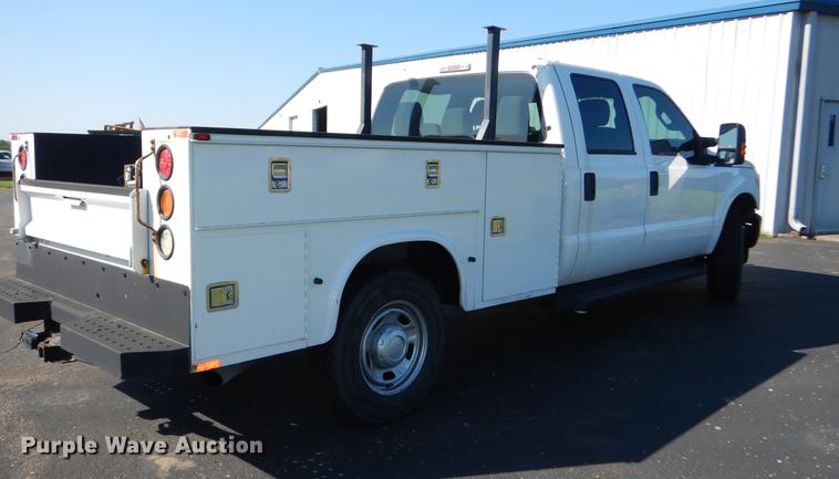 image for item DE1646 2012 Ford F250 Super Duty Crew Cab utility bed pickup truck
