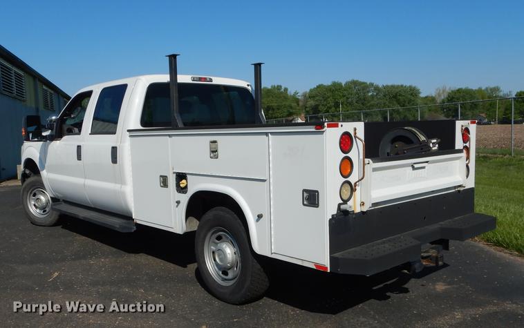 image for item DE1646 2012 Ford F250 Super Duty Crew Cab utility bed pickup truck