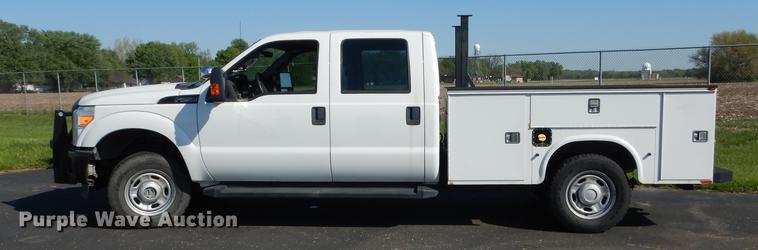 image for item DE1646 2012 Ford F250 Super Duty Crew Cab utility bed pickup truck