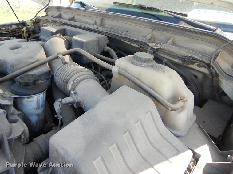 image for item DE1646 2012 Ford F250 Super Duty Crew Cab utility bed pickup truck