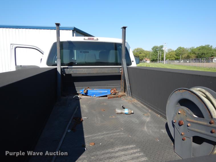 image for item DE1646 2012 Ford F250 Super Duty Crew Cab utility bed pickup truck