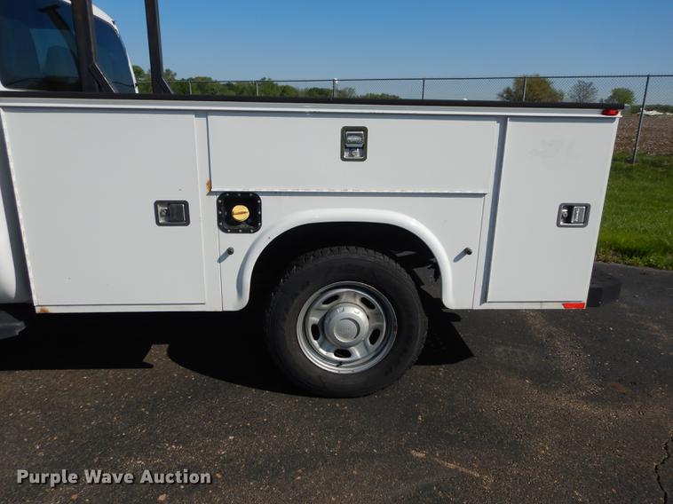 image for item DE1646 2012 Ford F250 Super Duty Crew Cab utility bed pickup truck