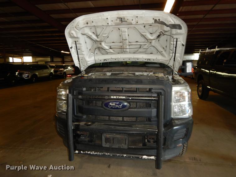 image for item DE1653 2012 Ford F250 Super Duty XL Crew Cab utility bed pickup truck