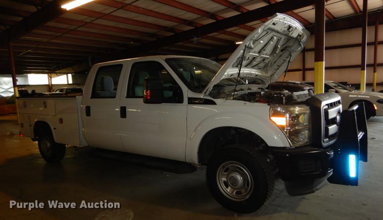 image for item DE1653 2012 Ford F250 Super Duty XL Crew Cab utility bed pickup truck