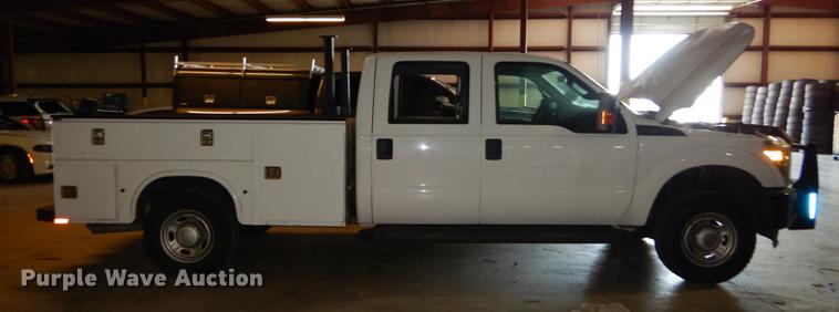 image for item DE1653 2012 Ford F250 Super Duty XL Crew Cab utility bed pickup truck