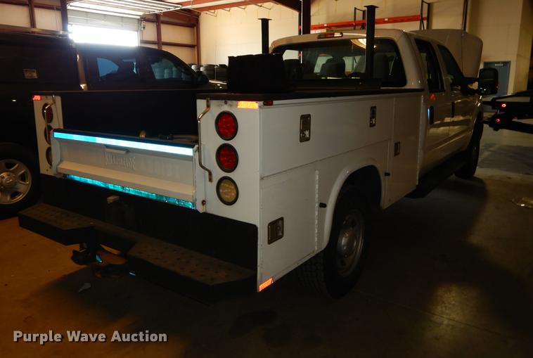 image for item DE1653 2012 Ford F250 Super Duty XL Crew Cab utility bed pickup truck
